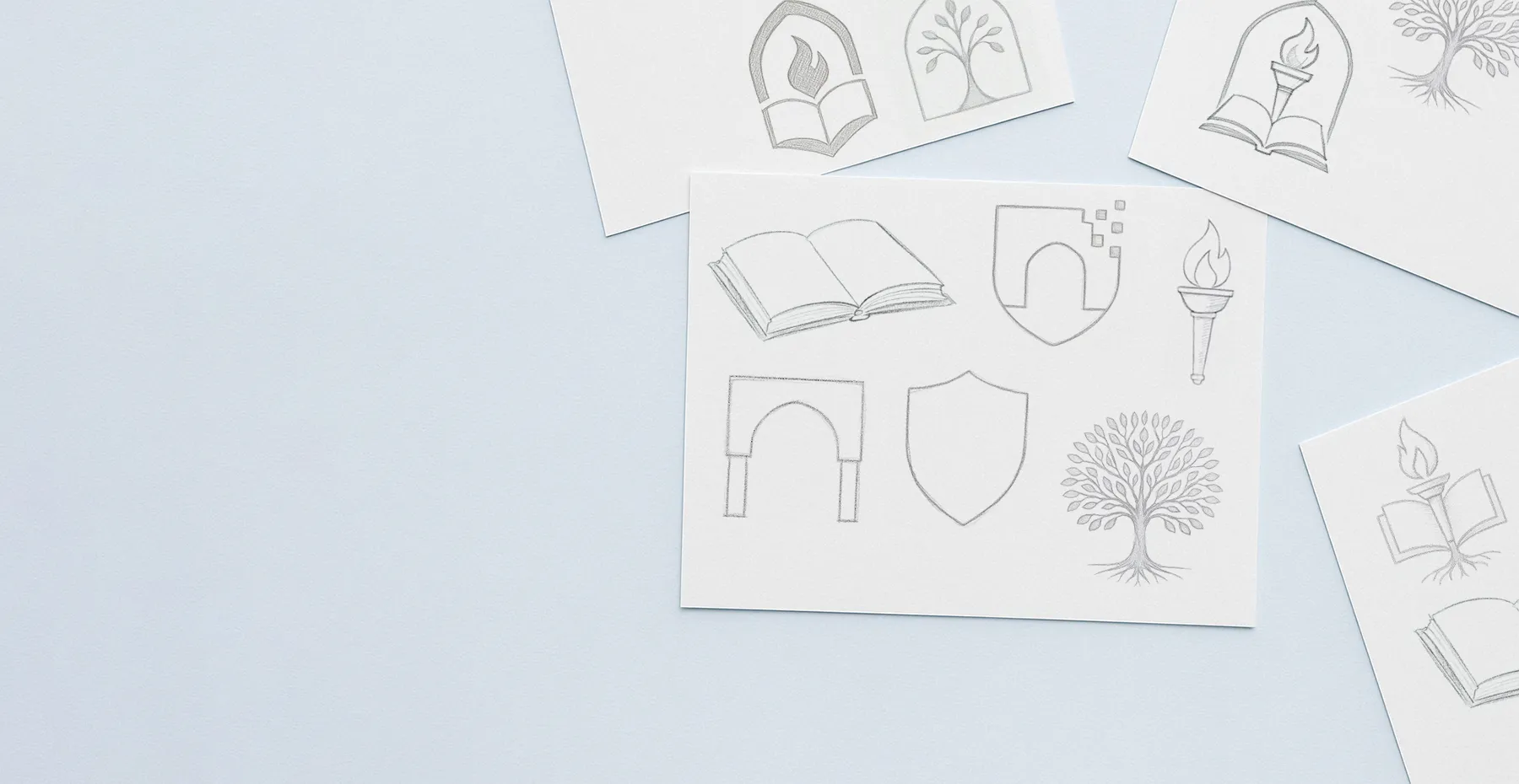 Visual identity sketch showcasing Fujairah mountains, sea, and educational symbols